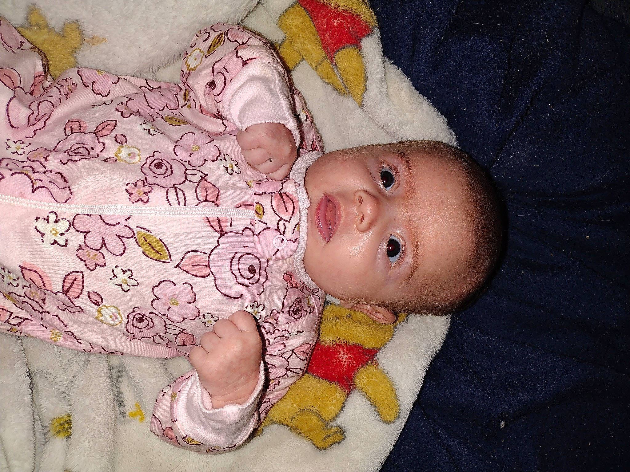 Lilly is registered to the contest to win money with this photo: baby, baby_products, baby_safety, baby_sleeping, baby_toddler_clothing, cheek, comfort, eye, face, finger, hand, head, human_body, linens, nose, person, pink, skin, sleeve, textile