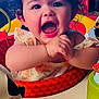 Scarlett joined the competition — help win amazing prizes! activity_center, baby, bright, cheerful, child, closeup, clothing, colorful, curly_hair, cute, expression, face, happy, indoor, infant, person, play, smiling, table, toy