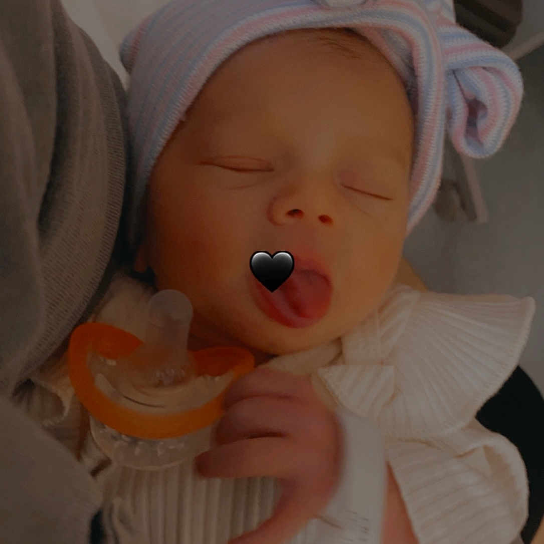 Layla joined the competition — help win amazing prizes! baby, baby_products, baby_safety, baby_toddler_clothing, baby_toys, cheek, child, chin, comfort, eye, human_body, iris, lip, mouth, nose, room, sitting, thumb, toddler, toy