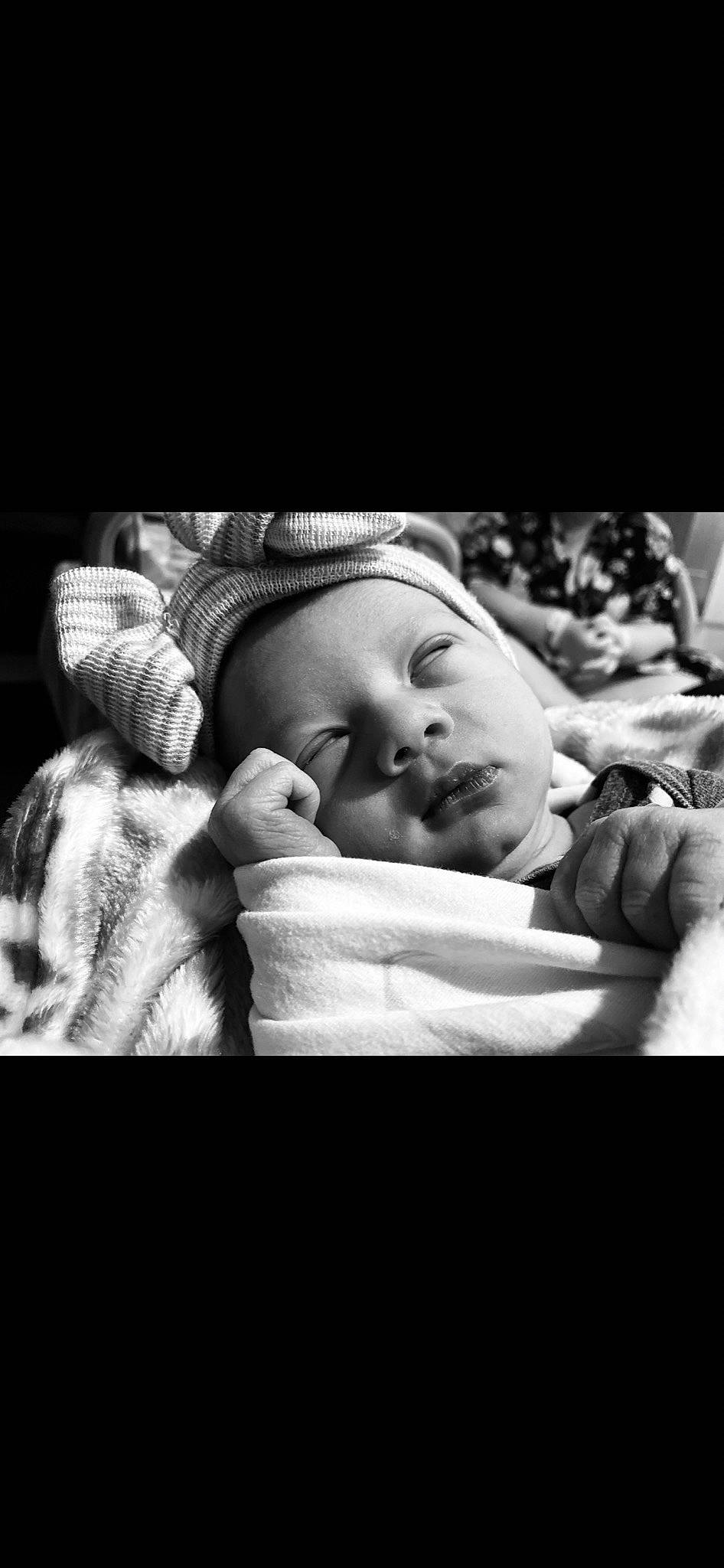 Layla joined the competition — help win amazing prizes! baby, baby_toddler_clothing, bedtime, cheek, child, comfort, darkness, eye, eyebrow, flash_photography, happy, headgear, monochrome, monochrome_photography, nap, person, portrait_photography, sitting, sleep, still_life_photography