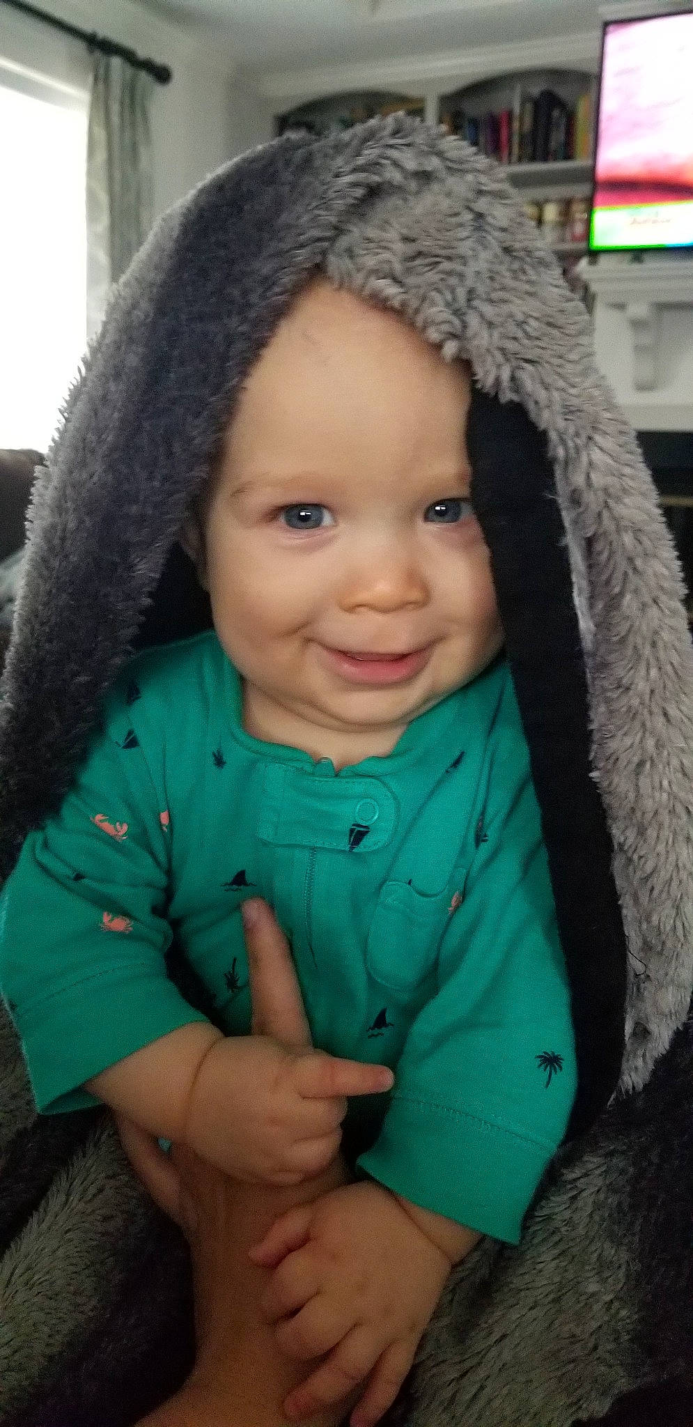 Kellen joined the competition — help win amazing prizes! baby, black_hair, bonnet, cheek, child, child_model, eye, face, forehead, fur, head, headgear, joy, knit_cap, lip, nose, outerwear, person, skin, smile