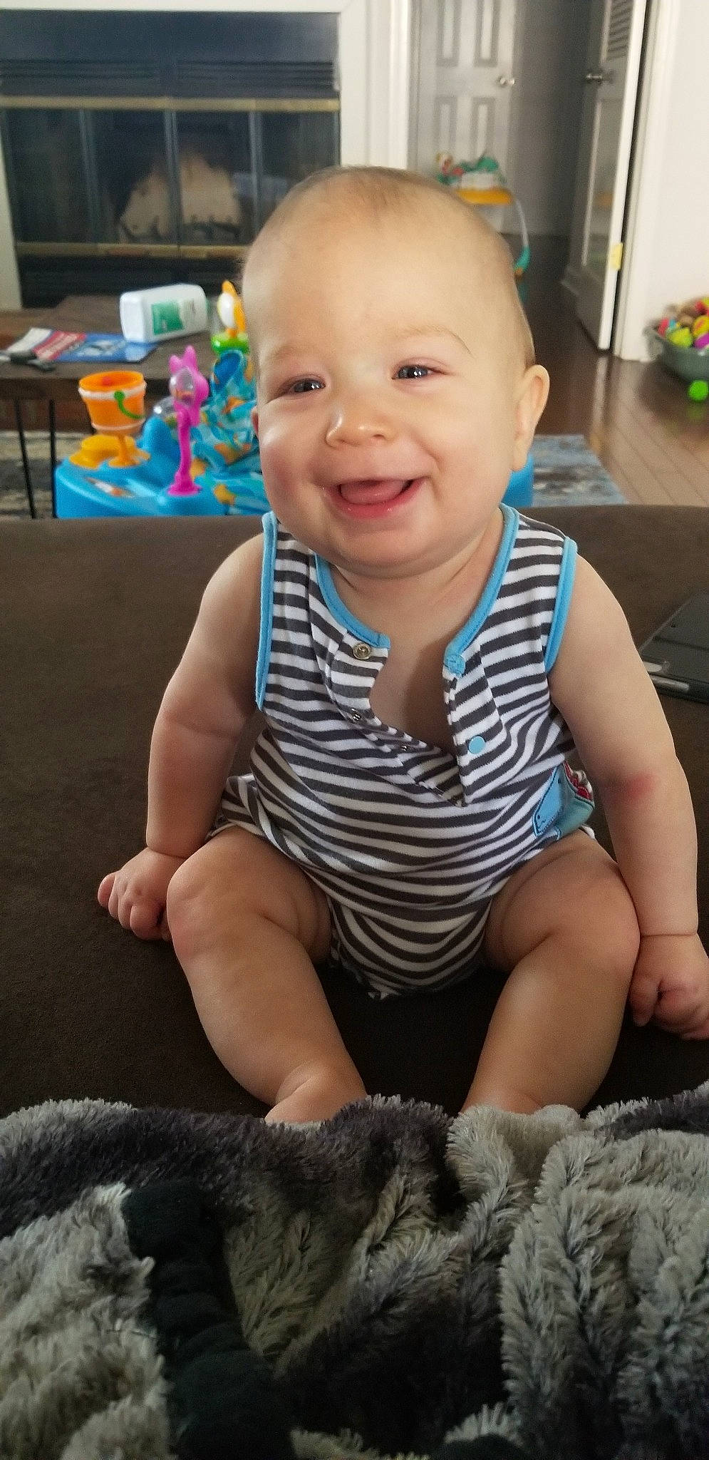 Kellen joined the competition — help win amazing prizes! baby, cheek, child, electronic_device, eye, face, facial_expression, head, joy, laugh, nose, person, sitting, skin, smile, toddler, vacation