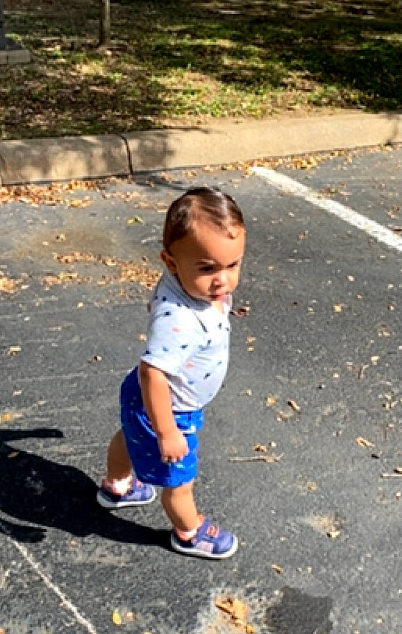 Darius joined the competition — help win amazing prizes! asphalt, baby, electric_blue, fun, grass, happy, leaf, leisure, people_in_nature, person, public_space, recreation, road, road_surface, sandal, sidewalk, tints_and_shades, toddler, tree, water