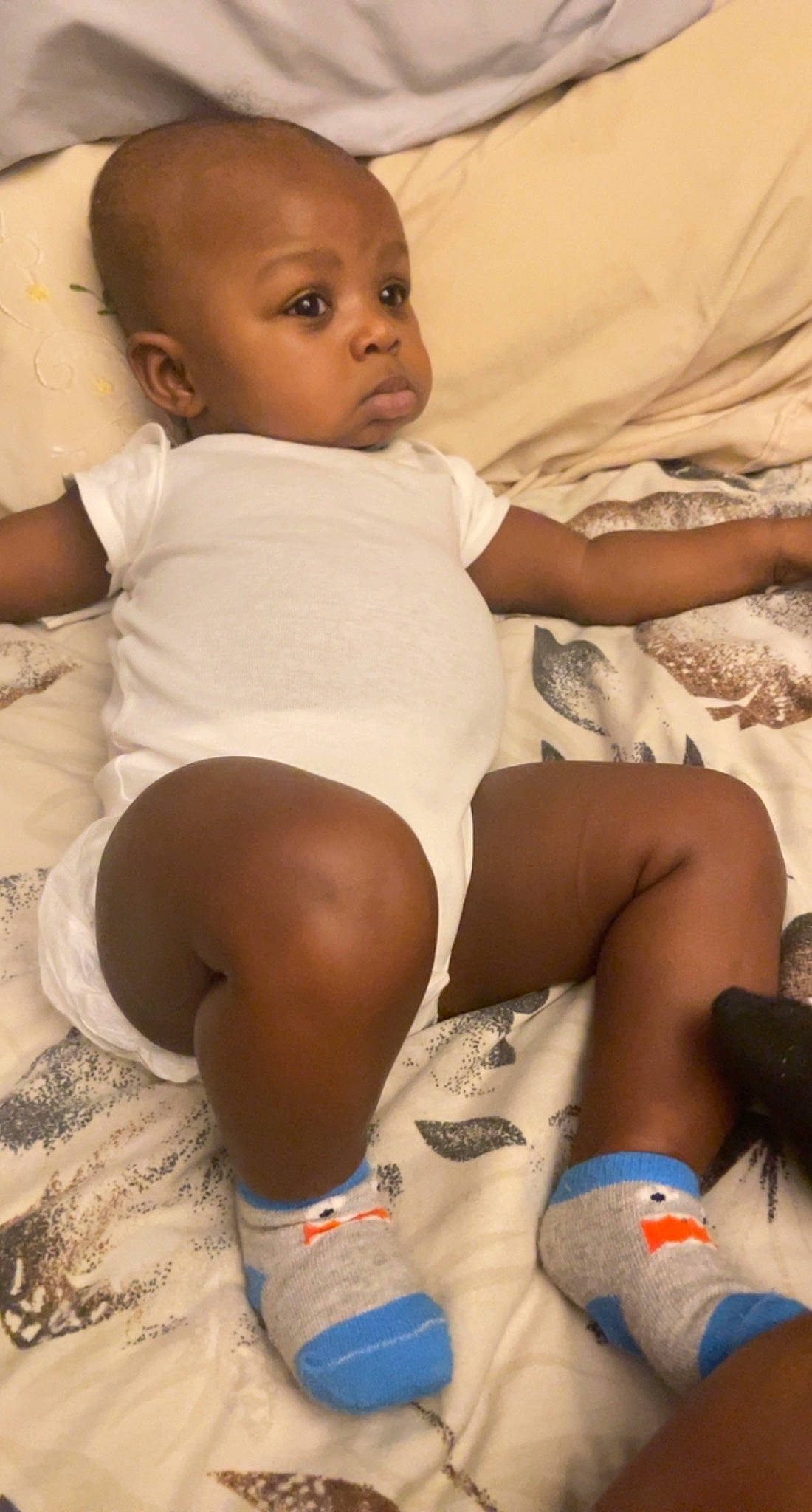 Jaivyn is registered to the contest to win money with this photo: baby, baby_toddler_clothing, cheek, chest, comfort, eye, finger, hand, human_body, joint, knee, leg, mouth, neck, person, shoulder, skin, stomach, thigh, trunk