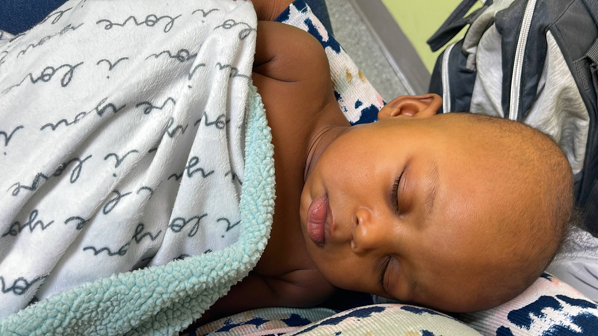 Jaivyn is registered to the contest to win money with this photo: abdomen, arm, baby, baby_products, baby_sleeping, bedding, bedtime, child, comfort, couch, eyelash, finger, happy, linens, nap, nose, pattern, person, room, skin