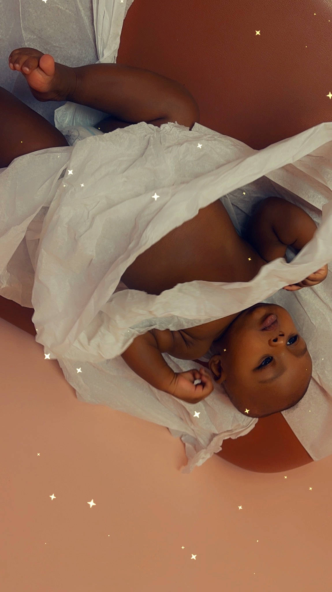 Jaivyn is registered to the contest to win money with this photo: abdomen, baby, bathing, bridal_accessory, chest, child, comfort, elbow, event, eyelash, flesh, gesture, happy, human_leg, linens, person, room, toddler, wrist