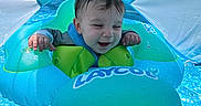 George joined the competition — help win amazing prizes! baby, blue, child, float, green, happy, infant, inflatable, laycool, outdoor, playful, pool, recreation, smiling, splash, summer, sunshade, swimming, water, wet