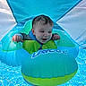 George joined the competition — help win amazing prizes! baby, child, pool, water, float, inflatable, laycool, blue, green, sunshade, swimming, summer, happy, smiling, wet, outdoor, recreation, infant, playful, splash
