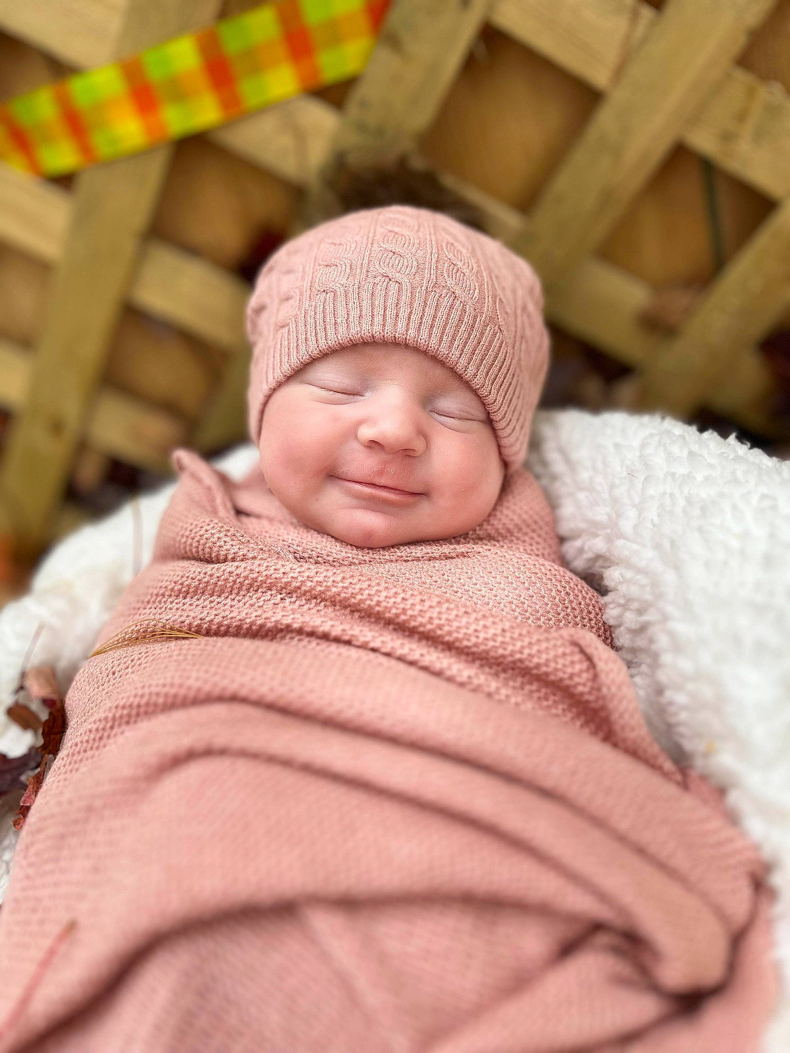 Dawn is registered to the contest to win money with this photo: baby, baby_toddler_clothing, beanie, cap, cheek, child, comfort, happy, headwear, knit_cap, linens, magenta, outerwear, person, room, skin, sleeve, smile, toddler, wood