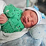Jaxon-John joined the competition — help win amazing prizes! newborn, baby, sleeping, green_onesie, hat, plush_toy, blanket, soft_toy, infant, cute, peaceful, portrait, child, indoors, cozy, resting, white_blanket, blue, knitted, closeup