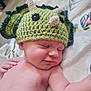 baby, sleeping, hat, crocheted, dinosaur, green, blanket, smile, peaceful, infant, cute, child, soft, relaxing, hand, skin, portrait, indoors, cozy, headwear