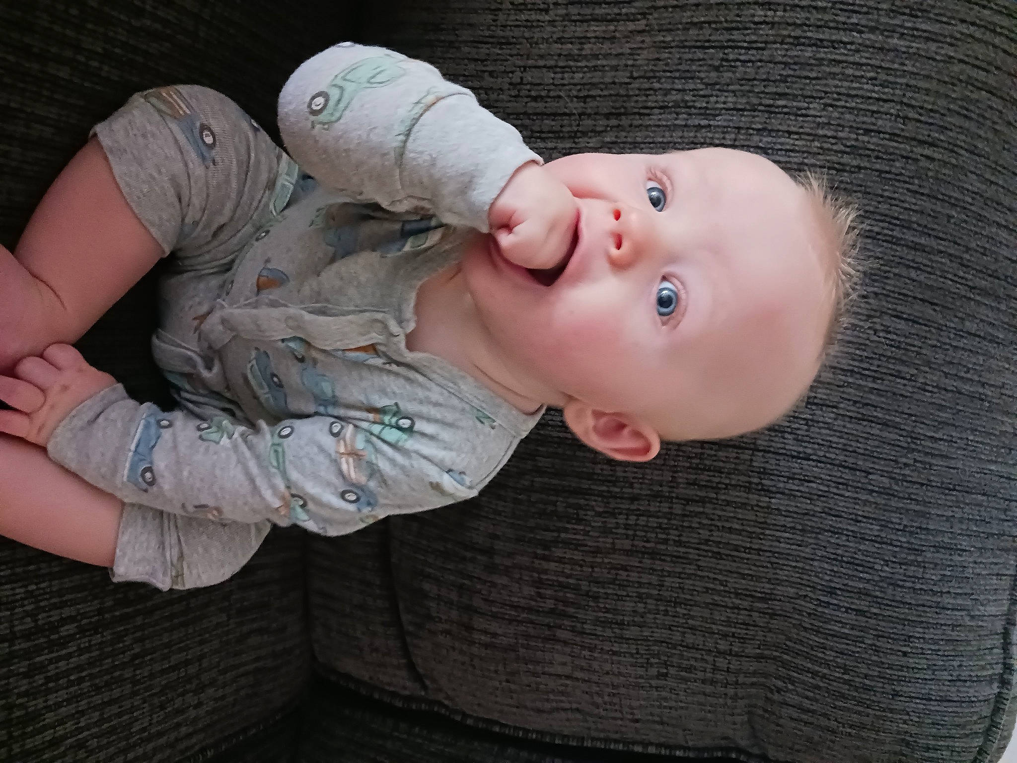 Archer is registered to the contest to win money with this photo: baby, baby_products, baby_toddler_clothing, cheek, child, comfort, elbow, eye, eyelash, gesture, hand, hat, lip, mouth, nail, nose, person, skin, sleeve, thumb