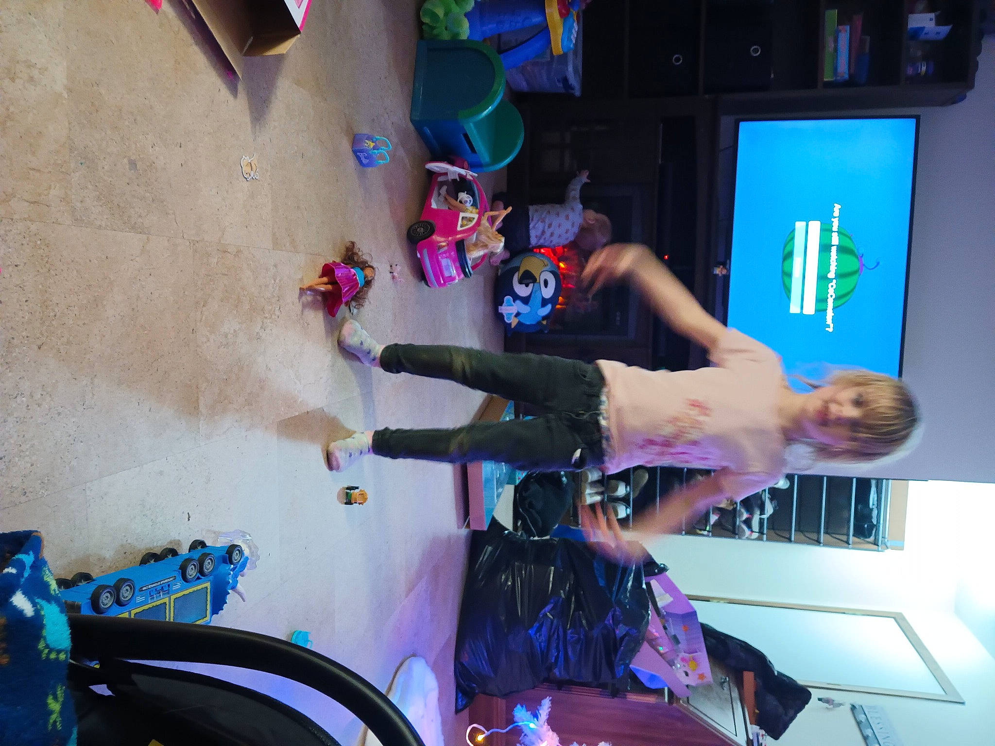 Brieanna is registered to the contest to win money with this photo: adventure, bicycle_wheel, blue, chair, display_device, electric_blue, entertainment, event, fun, leisure, machine, magenta, person, purple, recreation, room, sports_equipment, television, visual_arts