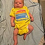 Gary joined the competition — help win amazing prizes! baby, infant, yellow_onesie, towel, blue_towel, lying_down, indoors, cute, clothing, person, child, newborn, face, skin, head, legs, arms, diaper, expression, curious
