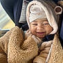 baby, blanket, bundle, car_interior, car_seat, cheeks, cozy, cute, eyebrows, face, fuzzy, happy, hat, hood, infant, portrait, seatbelt, smile, soft_texture, toddler