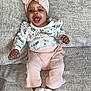baby, babylaughing, clothing, couch, cushion, face, footwear, furniture, happy, hat, head, homedecor, hosiery, pants, person, photography, portrait, shoe, sitting, sock