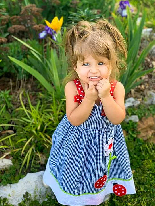 Khaleesi joined the competition — help win amazing prizes! baby_toddler_clothing, blue, dress, eye, face, flower, grass, hair, happy, head, iris, joy, leaf, people_in_nature, person, plant, purple, skin, sleeve, smile
