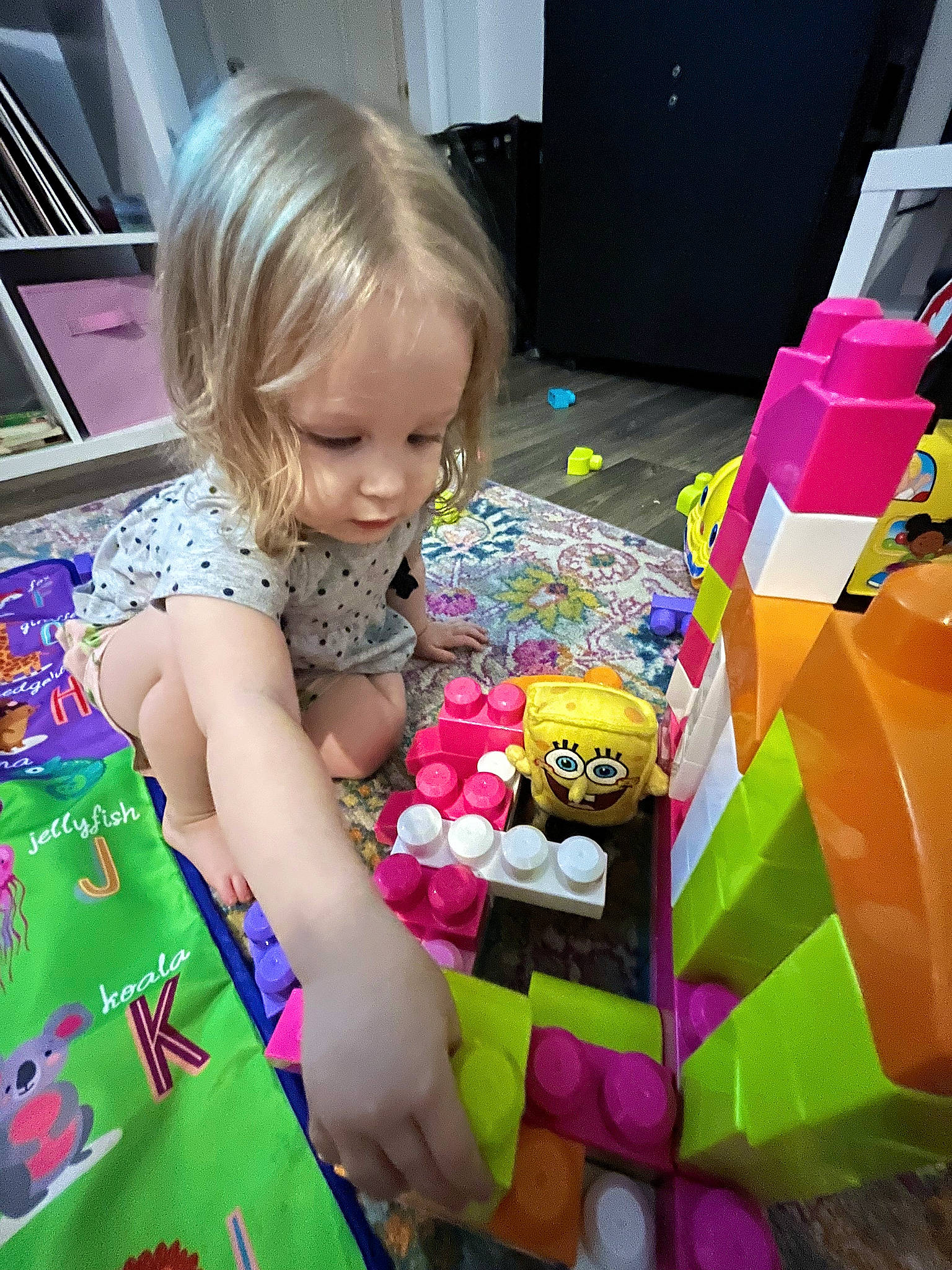 Alice joined the competition — help win amazing prizes! art, baby, beauty, child, flooring, fun, leisure, magenta, party, pattern, person, pink, play, product, purple, recreation, room, sitting, snapshot, toddler