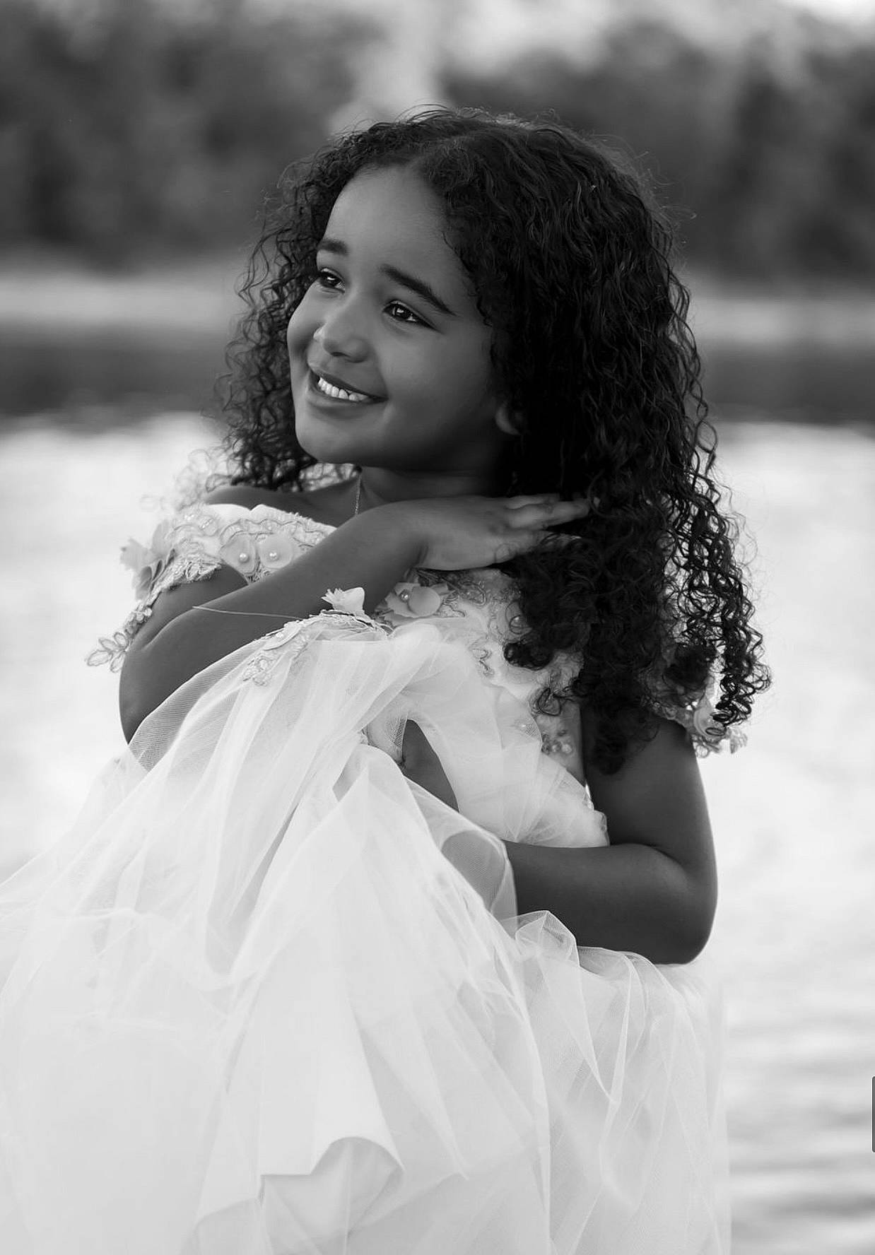 Samara is registered to the contest to win money with this photo: black, black_and_white, dress, eye, face, facial_expression, flash_photography, gesture, hair, hairstyle, happy, head, human, iris, joy, lip, people_in_nature, person, plant, shoulder