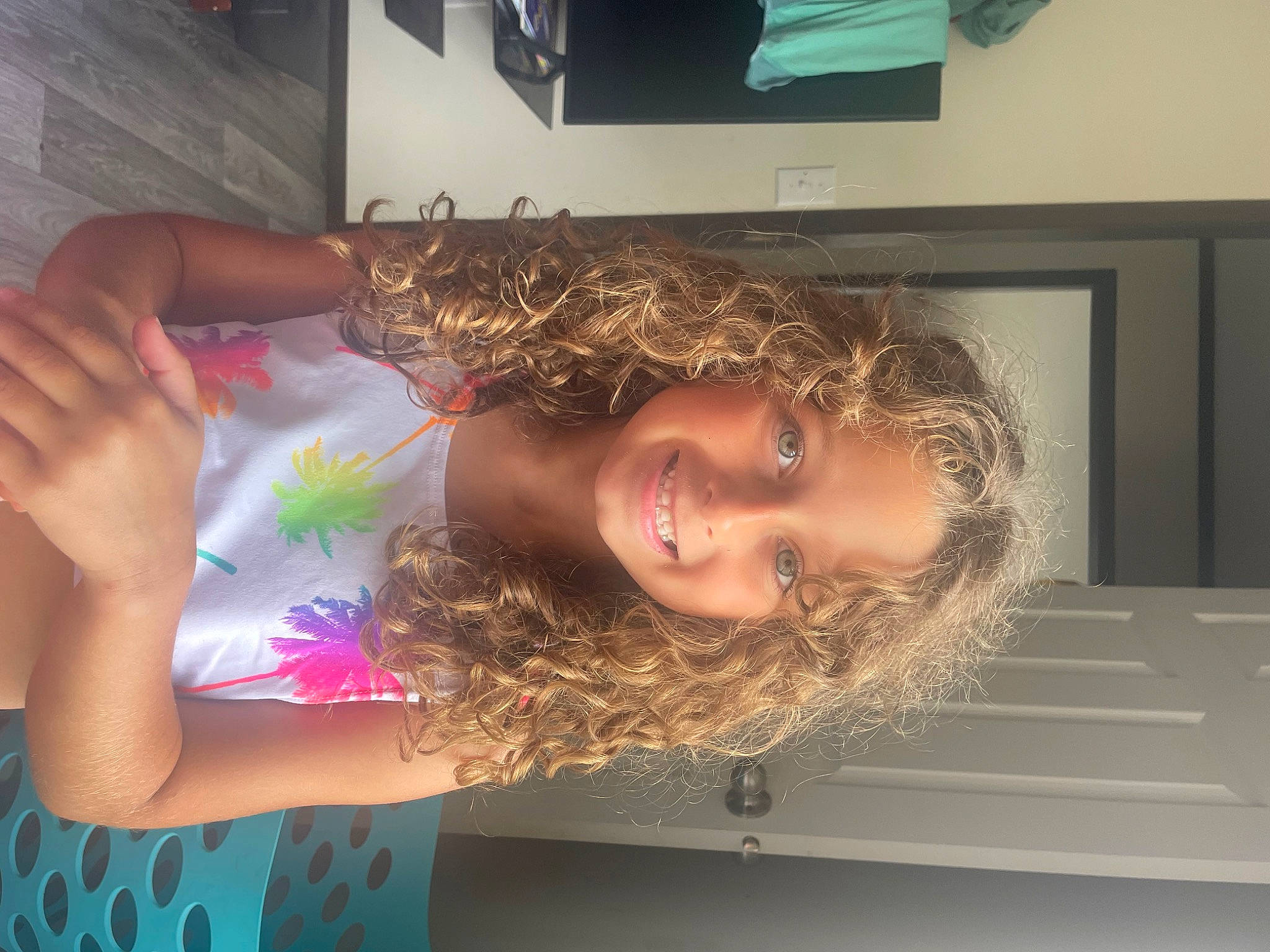 Ophelia is registered to the contest to win money with this photo: blond, brown_hair, child, eyebrow, eyelash, eyewear, flooring, fun, hair_coloring, happy, human_leg, iris, joy, leisure, long_hair, neck, person, room, selfie, shoulder