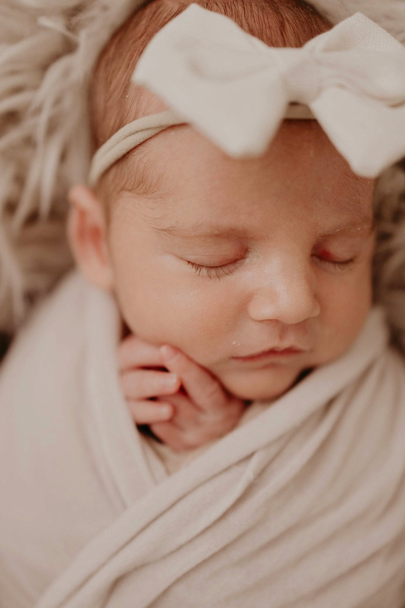 Rosalie is registered to the contest to win money with this photo: baby, baby_toddler_clothing, cheek, child, close_up, comfort, ear, eye, eyebrow, eyelash, grass, hair_accessory, happy, headwear, iris, lip, nose, peach, person, portrait_photography