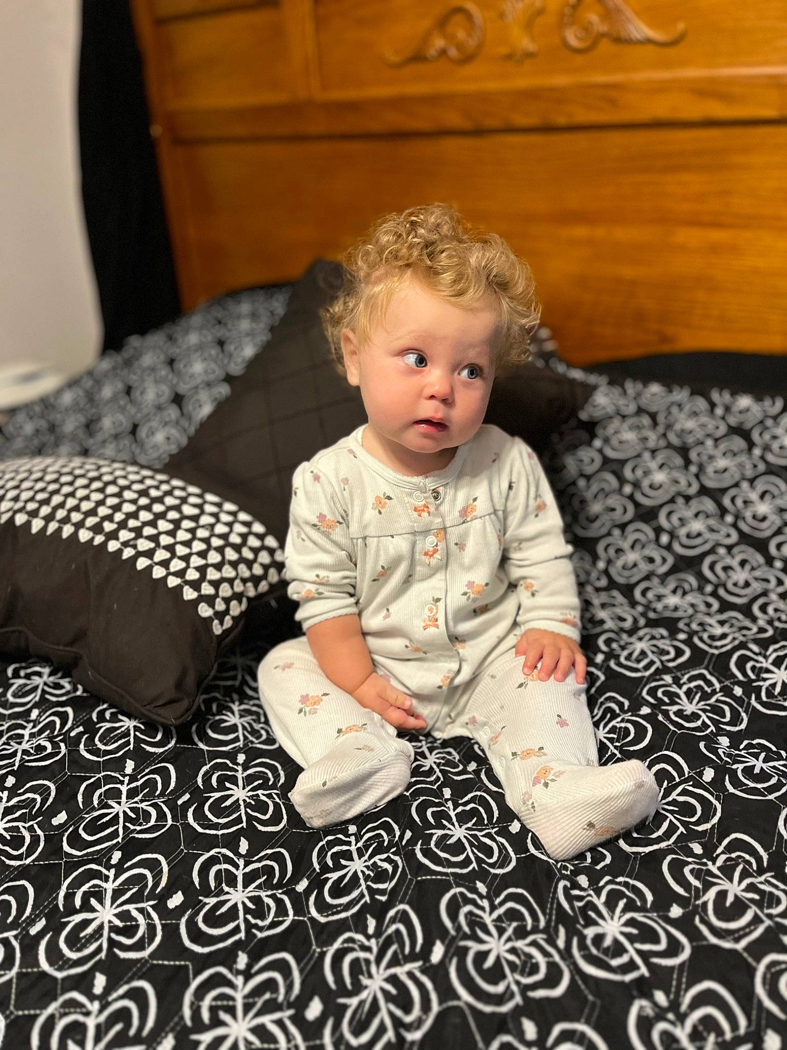 Ella is registered to the contest to win money with this photo: baby, baby_toddler_clothing, cabinetry, carpet, chair, child, comfort, eye, floor, flooring, fun, hardwood, linens, pattern, person, room, sitting, sleeve, toddler, vertebrate