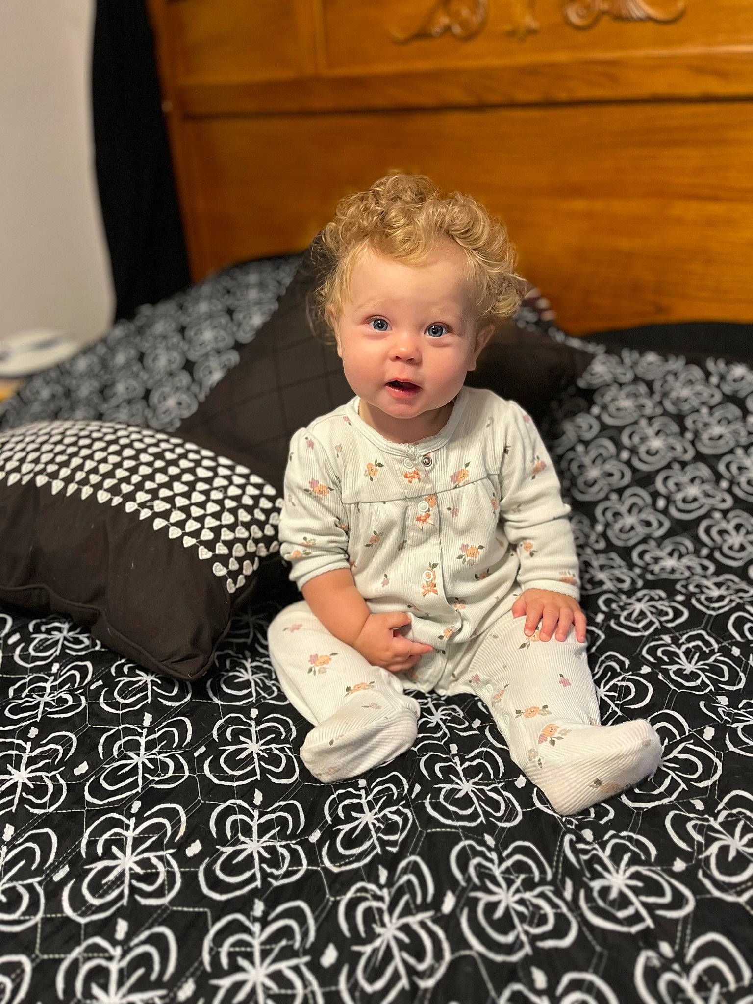 Ella is registered to the contest to win money with this photo: baby, baby_toddler_clothing, cabinetry, carpet, chair, child, comfort, floor, flooring, fun, hardwood, linens, pattern, person, room, rug, sitting, sleeve, toddler, wood