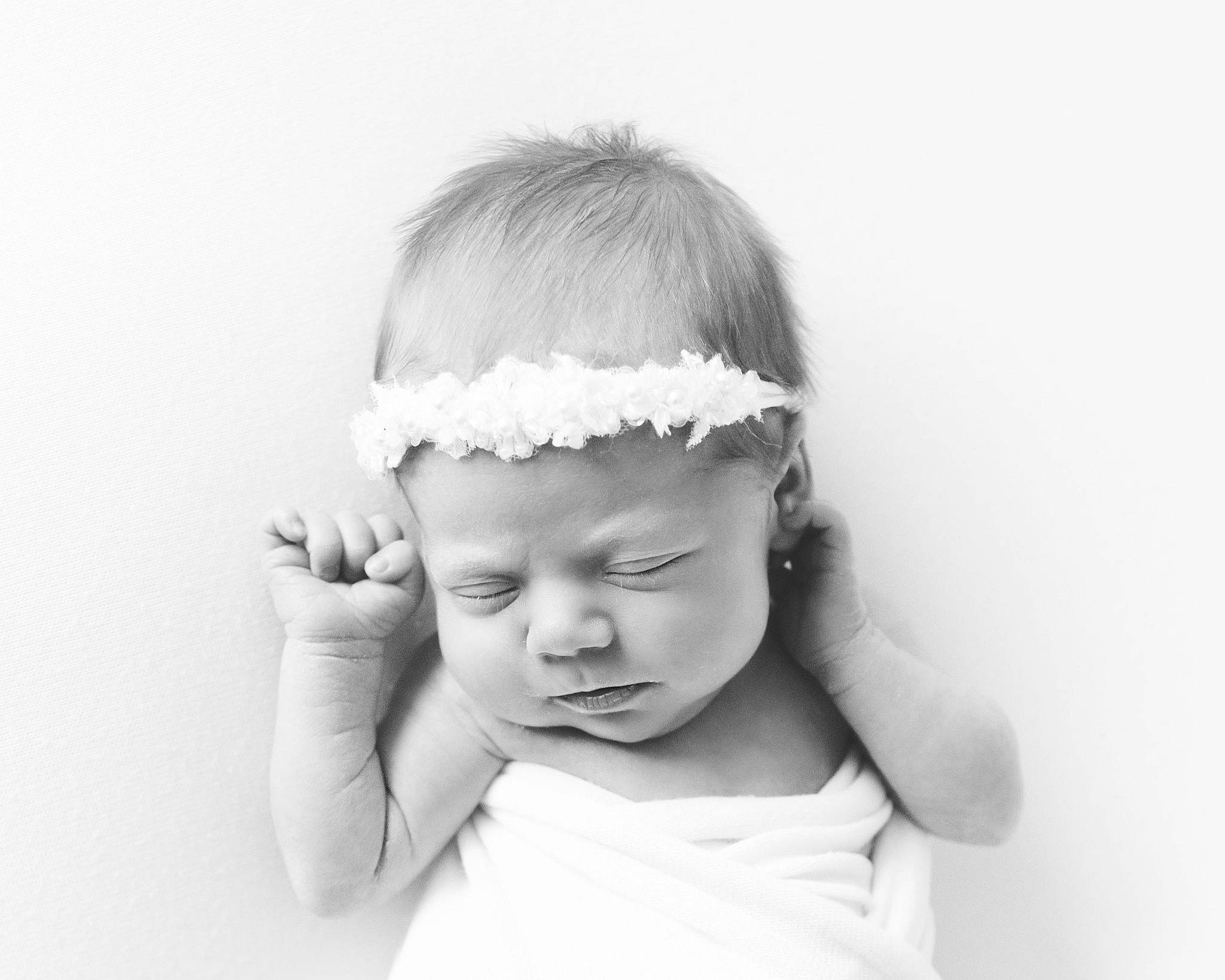 Darci is registered to the contest to win money with this photo: baby, black_and_white, child, child_model, face, fashion_accessory, forehead, hair_accessory, head, headband, headgear, headpiece, monochrome, monochrome_photography, person, photograph, photography, portrait_photography, stock_photography, toddler