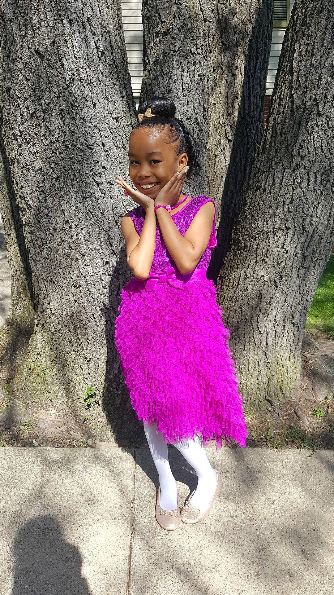 Ron'Niya is registered to the contest to win money with this photo: abdomen, child, costume, dance_dress, fun, girl, happiness, joy, magenta, pink, purple, shoe, smile, toddler, tree, trunk