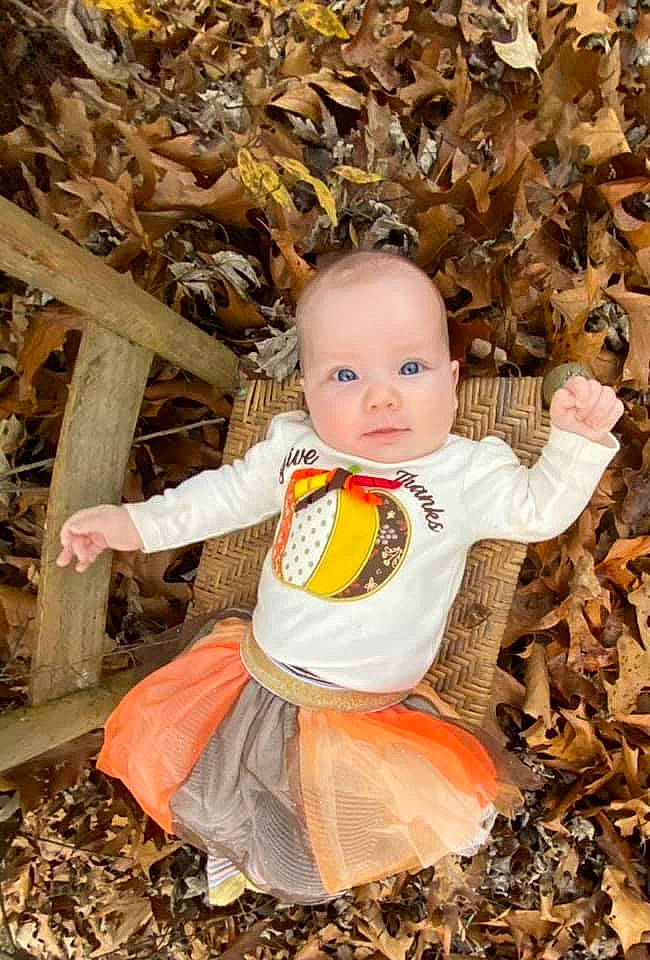 Laney is registered to the contest to win money with this photo: autumn, baby, baby_toddler_clothing, child, child_model, deciduous, fun, leaf, person, photograph, photography, plant, play, portrait, sitting, smile, toddler, tree, yellow
