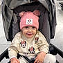 Romy participe au concours pour gagner de l'argent avec cette photo : toddler, child, smile, hat, pom_poms, sweater, minnie_mouse, stroller, seated, indoor, shopping, clothing, cute, happy, person, baby, fashion, accessory, retail, floor_tiles