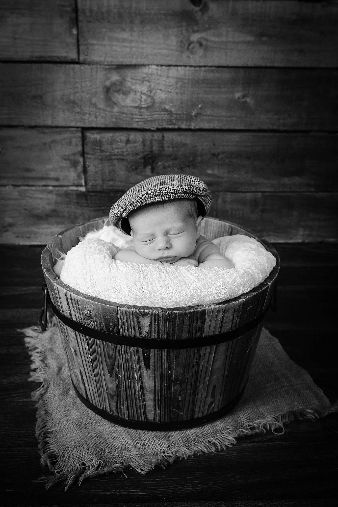 Thomas is registered to the contest to win money with this photo: baby, basket, black_and_white, child, comfort, darkness, face, flash_photography, happy, head, monochrome, monochrome_photography, person, portrait, portrait_photography, room, sitting, still_life_photography, stock_photography, toddler