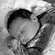 Macie joined the competition — help win amazing prizes! baby, newborn, sleeping, blanket, clothing, face, infant, knitted, pattern, floral, portrait, peaceful, cute, monochrome, cozy, resting, soft, indoors, closeup, child