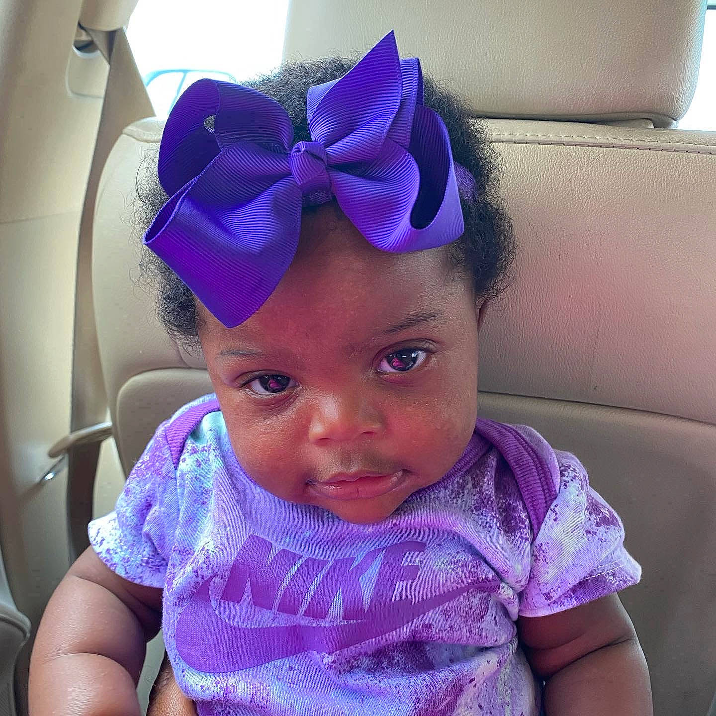 Chariah is registered to the contest to win money with this photo: baby_toddler_clothing, blue, cool, costume_hat, ear, eyebrow, eyelash, facial_expression, fun, hairstyle, happy, magenta, morning, mouth, neck, person, pink, purple, t_shirt, toddler