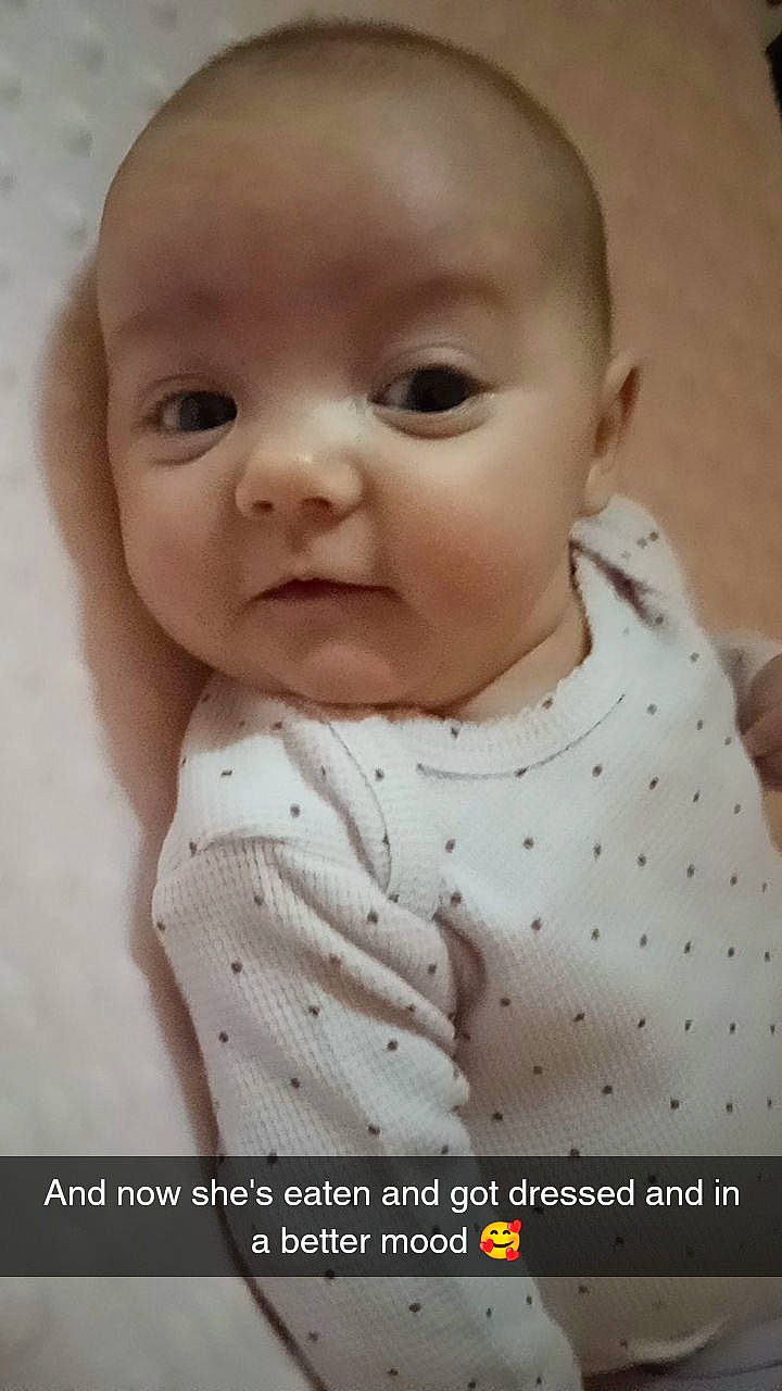 Lily May is registered to the contest to win money with this photo: baby, baby_toddler_clothing, cheek, child, collar, comfort, eyelash, happy, iris, lip, neck, pattern, person, portrait_photography, sitting, skin, sleeve, toddler