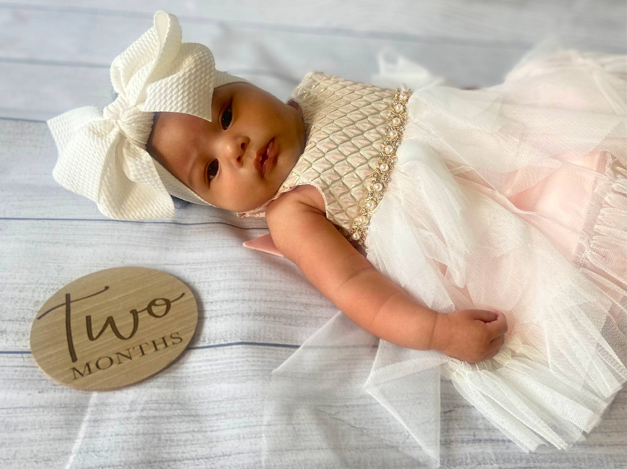 Naleia is registered to the contest to win money with this photo: baby, baby_safety, baby_sleeping, baby_toddler_clothing, bed, bedding, bedtime, child, comfort, facial_expression, fashion_accessory, happy, headwear, linens, pattern, person, product, room, skin, textile