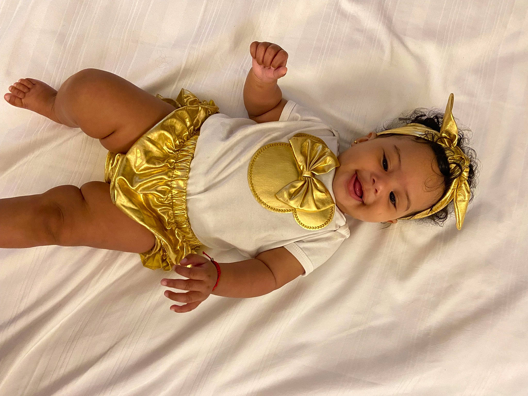 Naleia is registered to the contest to win money with this photo: baby, baby_sleeping, baby_toddler_clothing, child, comfort, fashion_accessory, finger, foot, fun, gesture, happy, human_body, human_leg, linens, pattern, person, sleeve, thigh, thumb, toddler