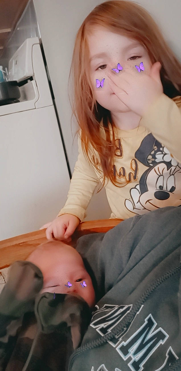 Hope is registered to the contest to win money with this photo: arm, cheek, comfort, eyelash, finger, gesture, hair, hairstyle, joint, knee, lip, mouth, muscle, neck, organ, person, shoulder, skin, sleeve, thigh