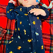Maverick joined the competition — help win amazing prizes! baby, infant, pacifier, onesie, animal_print, blue_clothing, plaid_blanket, red_blanket, sleeping, lying_down, child, cute, soft_toys, comfort, indoor, portrait, small_hand, peaceful, nap, cozy
