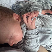 Haven joined the competition — help win amazing prizes! adult, baby, bed, blanket, child, closed_eyes, clothing, cozy, cuddling, ear, face, family, finger, hand, indoors, infant, onesie, portrait, resting, sleeping