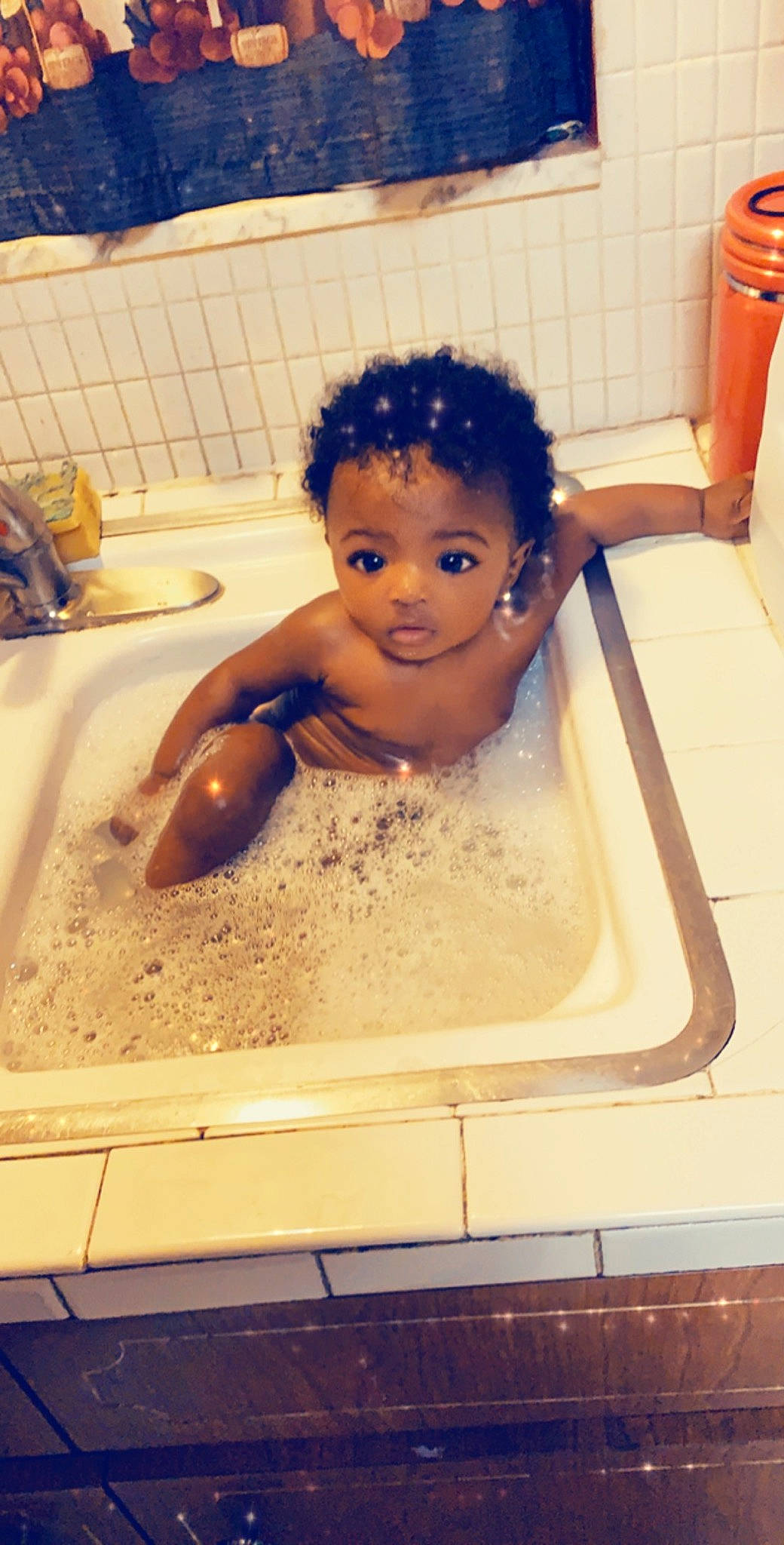 Janessa is registered to the contest to win money with this photo: baby_bathing, bathing, bathtub, child, fun, hair, leisure, person, toddler, washing, water