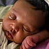 Kori joined the competition — help win amazing prizes! baby, sleeping, face, hand, curly_hair, blanket, closeup, infant, peaceful, skin, cheeks, portrait, resting, soft_light, cozy, child, newborn, cute, indoors, calm
