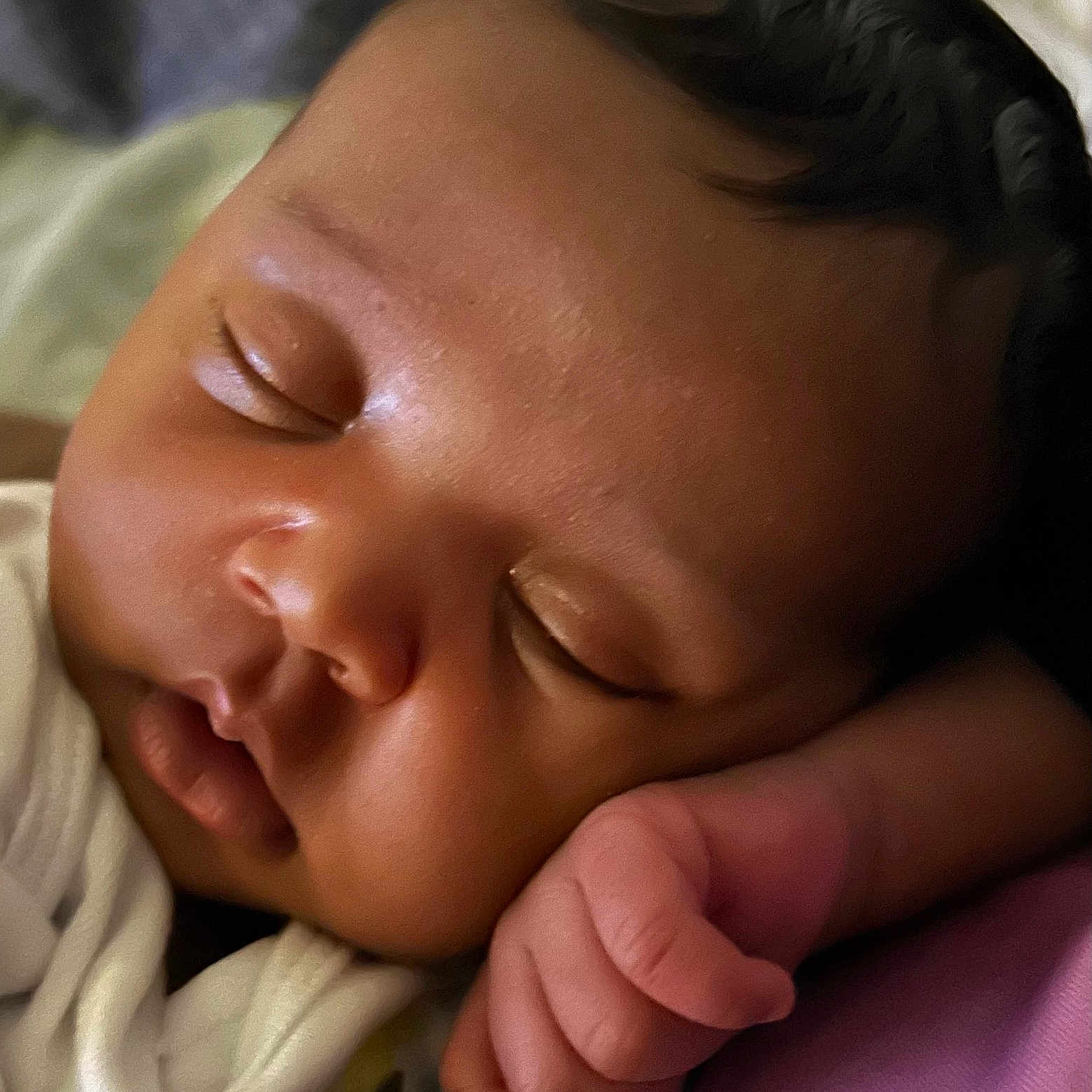 Kori joined the competition — help win amazing prizes! baby, sleeping, face, hand, curly_hair, blanket, closeup, infant, peaceful, skin, cheeks, portrait, resting, soft_light, cozy, child, newborn, cute, indoors, calm
