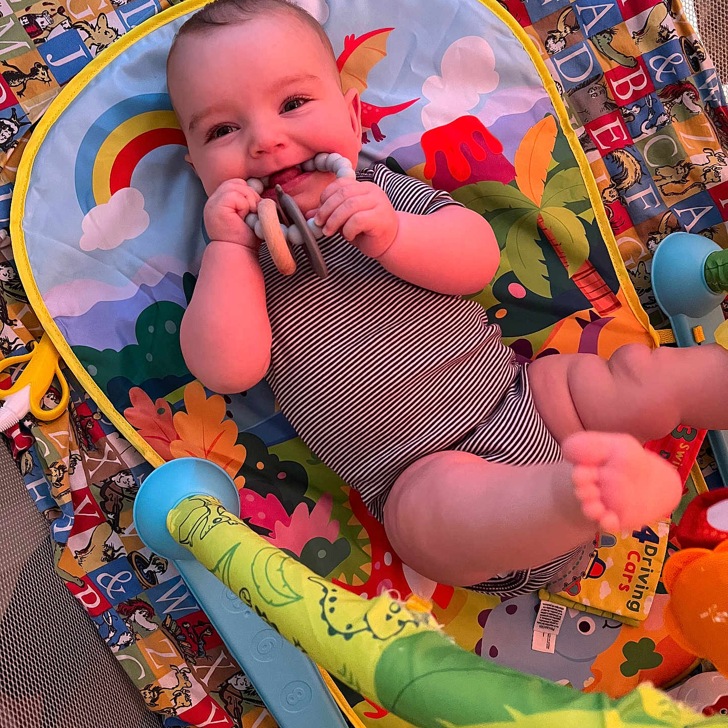 Garrett is registered to the contest to win money with this photo: baby, bodypart, clothing, couch, crib, cutlery, face, finger, furniture, hand, head, homedecor, infantbed, person, photography, portrait, quilt, sitting, spoon, toy