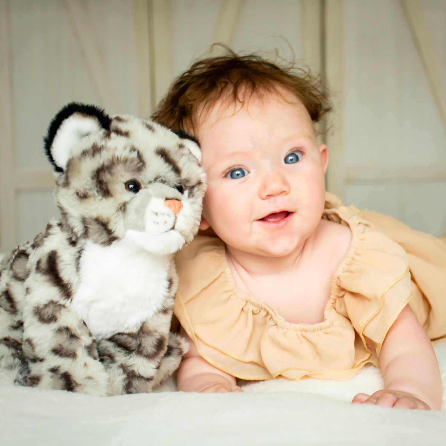 Nevaeh is registered to the contest to win money with this photo: animal, baby, blanket, bodypart, cat, couch, face, finger, hand, happy, head, kitten, person, pet, photography, plush, portrait, smile, tiger, toy