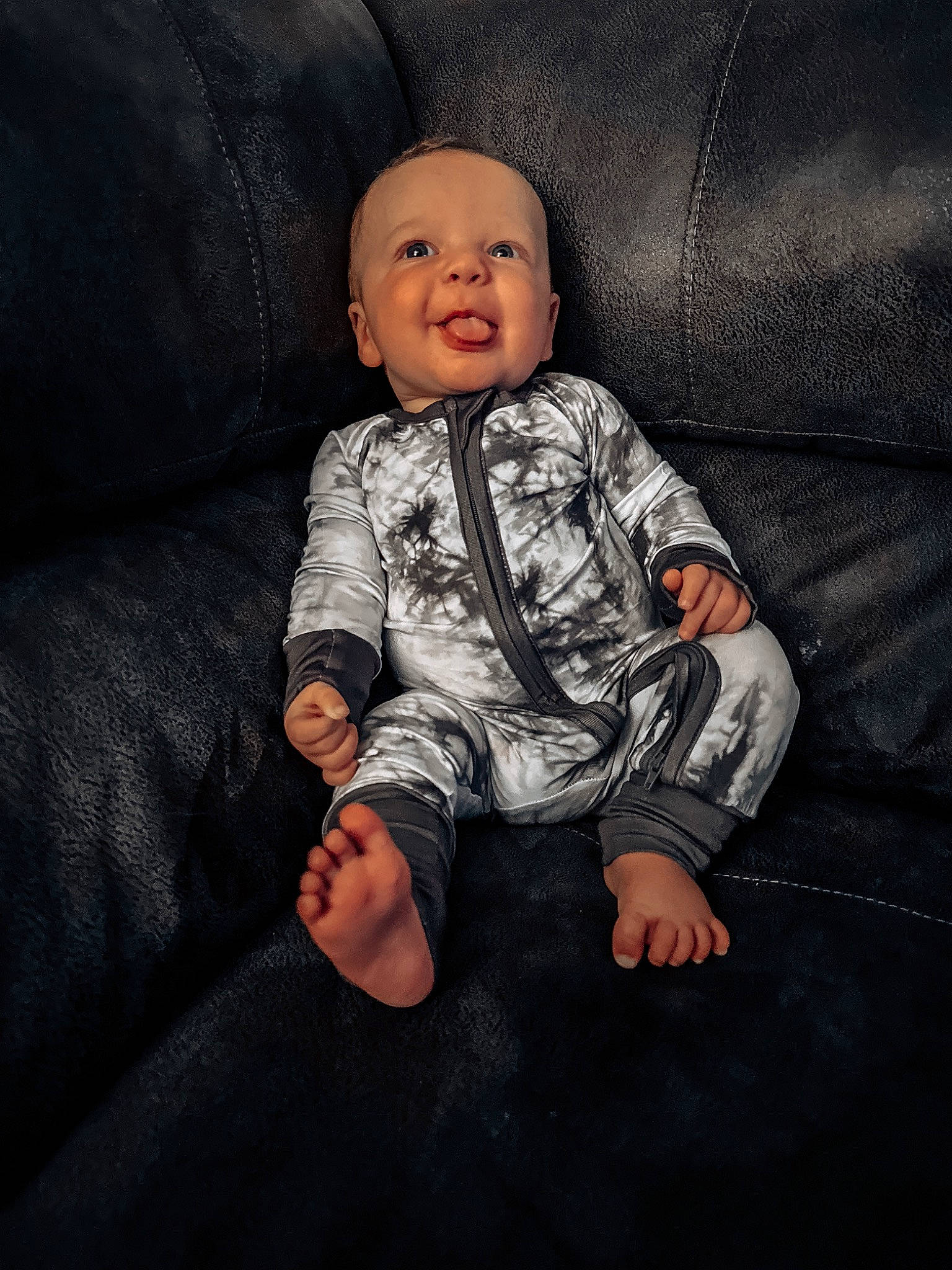 Kyson joined the competition — help win amazing prizes! baby, baby_toddler_clothing, cheek, child, collar, comfort, couch, darkness, flash_photography, grey, happy, linens, pattern, person, portrait_photography, sitting, sleeve, smile, t_shirt, textile