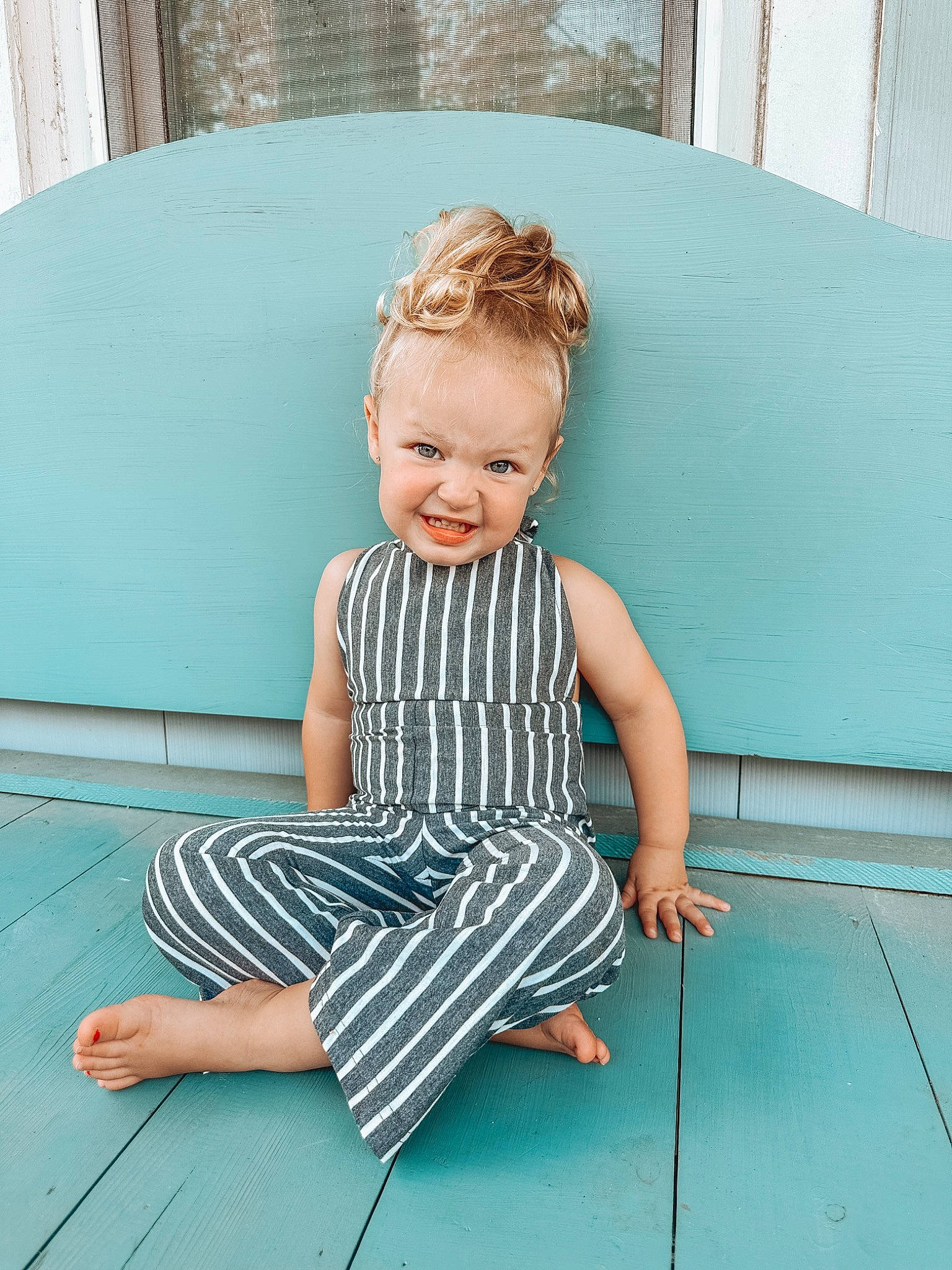 Braylee is registered to the contest to win money with this photo: aqua, azure, baby, baby_toddler_clothing, chair, child, couch, day_dress, dress, grass, green, joint, joy, pattern, person, sitting, sleeve, standing, table, toddler