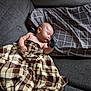 Aiden is registered to the contest to win money with this photo: baby, bed, blanket, bodypart, couch, cushion, face, finger, furniture, hand, head, homedecor, linen, newborn, person, photography, portrait, quilt, sleeping, tartan