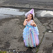 Avery joined the competition — help win amazing prizes! child, clothing, costume, dress, eveningdress, face, fashion, female, formalwear, girl, gown, gravel, hat, head, person, photography, portrait, puddle, road, water