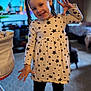 Avery is registered to the contest to win money with this photo: accessories, bodypart, child, clothing, dress, face, female, finger, formalwear, girl, hand, happy, head, longsleeve, pattern, person, photography, portrait, sleeve, smile
